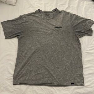 PATAGONIA heather gray T-shirt with fish logo on back